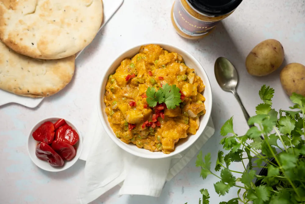 Indisches Curry mit Kartoffeln und Erbsen